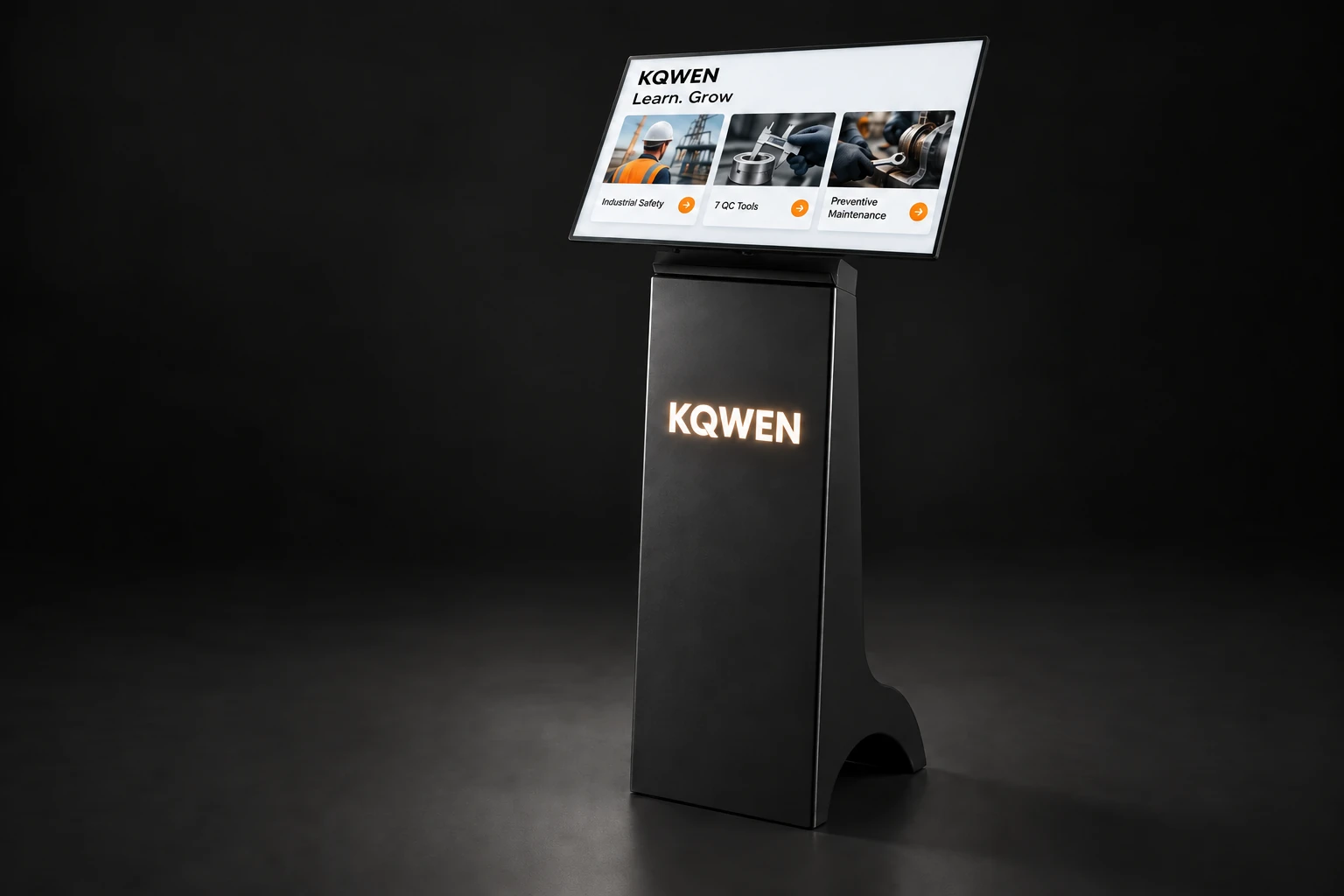 Black KQWEN kiosk showing Learn. Grow, three industry courses and a fully illuminated warm-white KQWEN logo